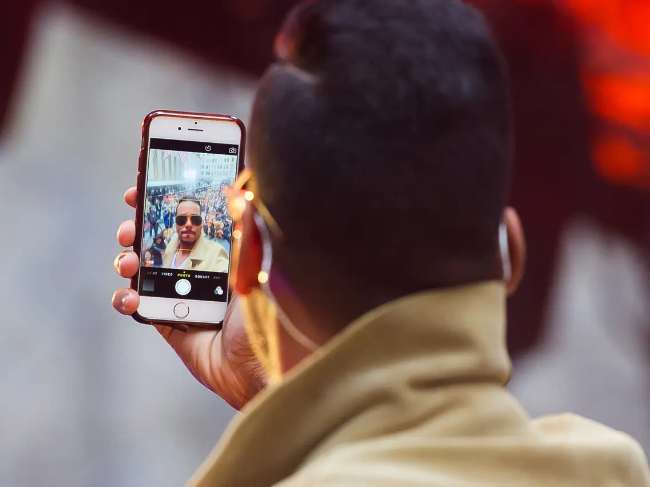 7 Cara Mematikan Suara Kamera iPhone yang Mengganggu